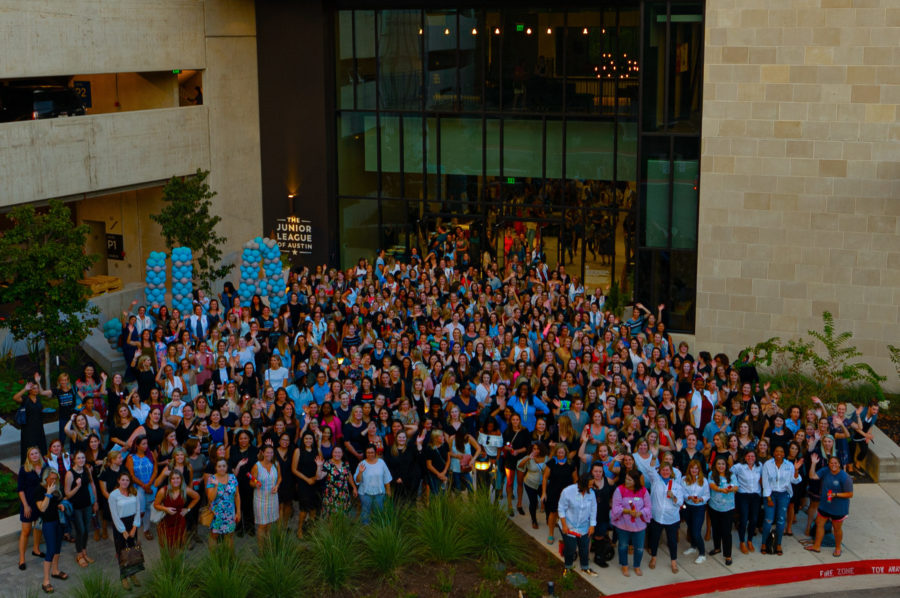 JLA members stand outside of the Community Impact Center in an aerial photo.